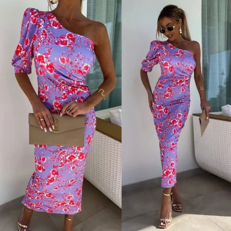 Woman wearing a printed one-shoulder midi dress with a single puff sleeve and fitted silhouette - view 4