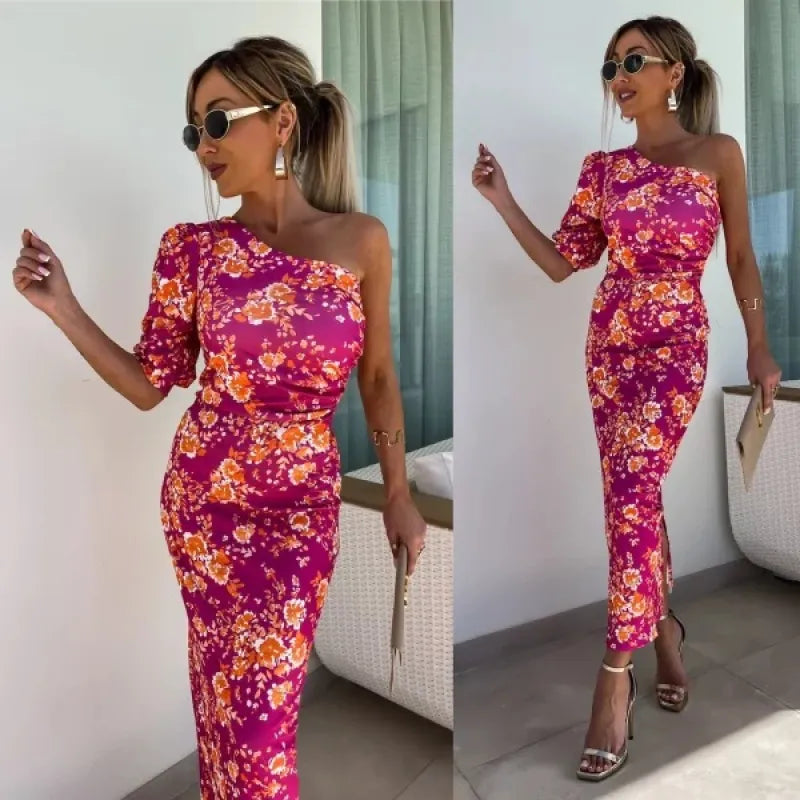 Woman wearing a printed one-shoulder midi dress with a single puff sleeve and fitted silhouette - view 5
