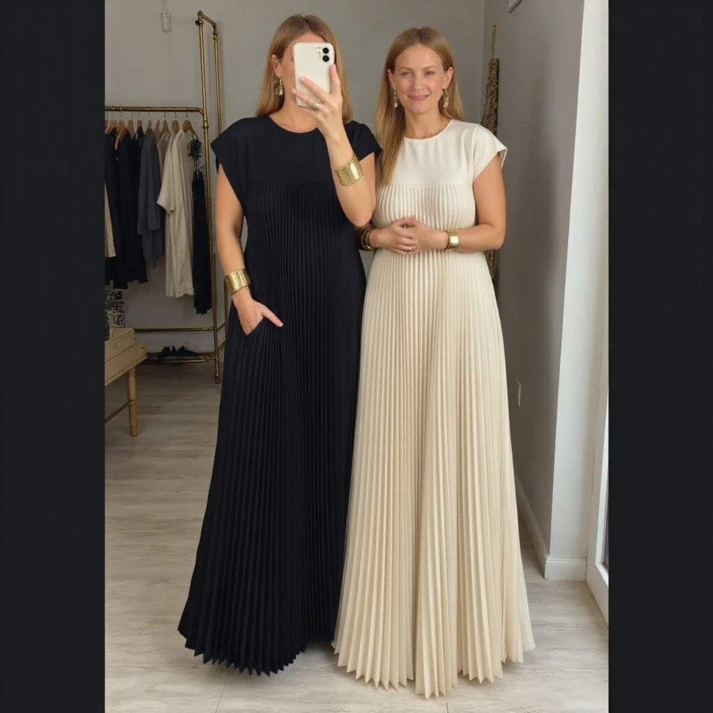 Woman wearing a pleated cocktail maxi dress with round neck and cap sleeves - view 10