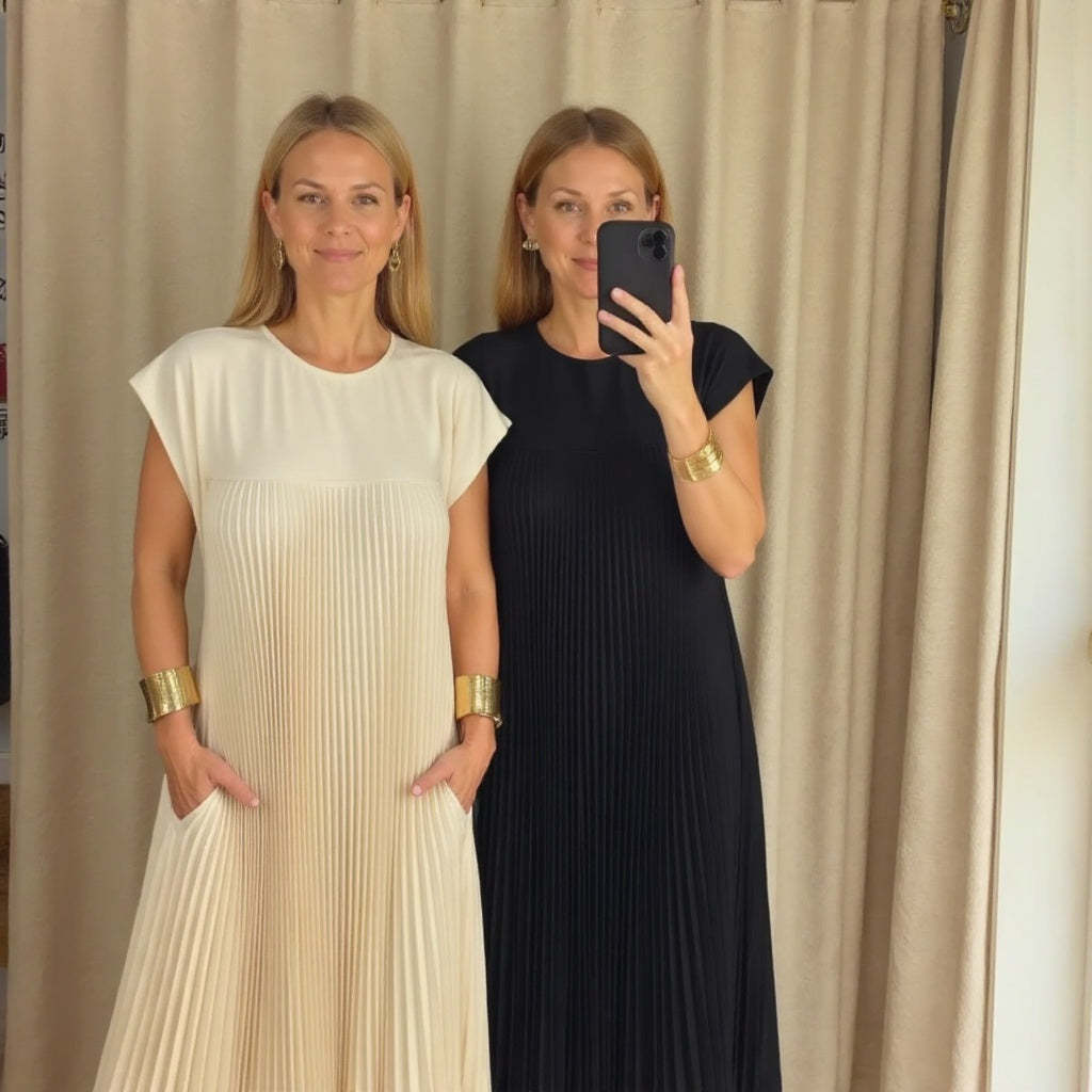 Woman wearing a pleated cocktail maxi dress with round neck and cap sleeves - view 13