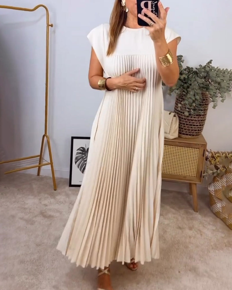 Woman wearing a pleated cocktail maxi dress with round neck and cap sleeves - view 16