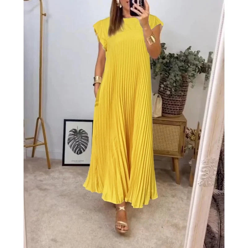Woman wearing a pleated cocktail maxi dress with round neck and cap sleeves - view 5