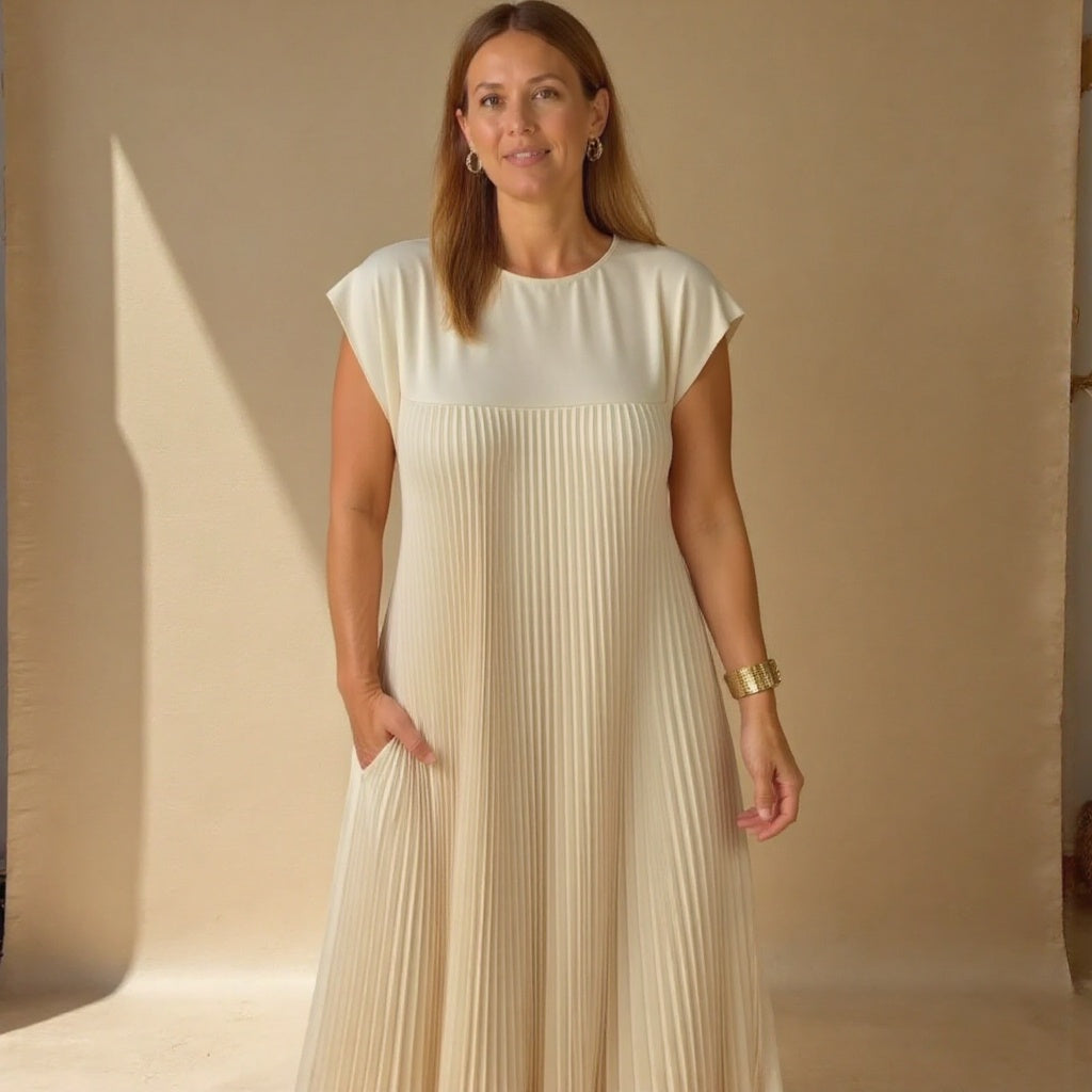Woman wearing a pleated cocktail maxi dress with round neck and cap sleeves - view 8