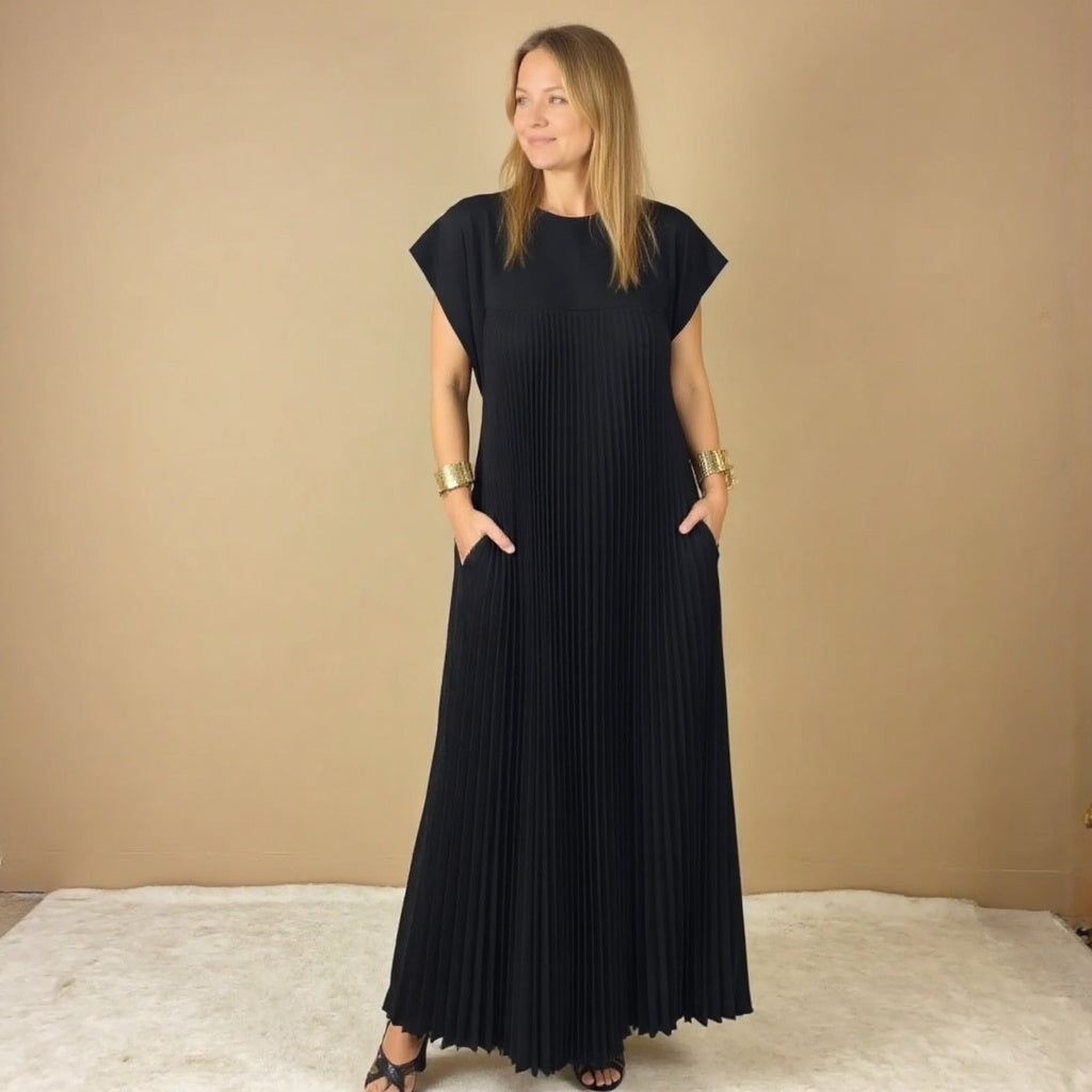 Woman wearing a pleated cocktail maxi dress with round neck and cap sleeves - view 9