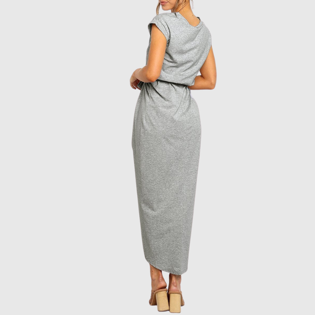 Woman wearing the Neve tie waist midi dress with cap sleeves and wrap-front slit skirt - view 21