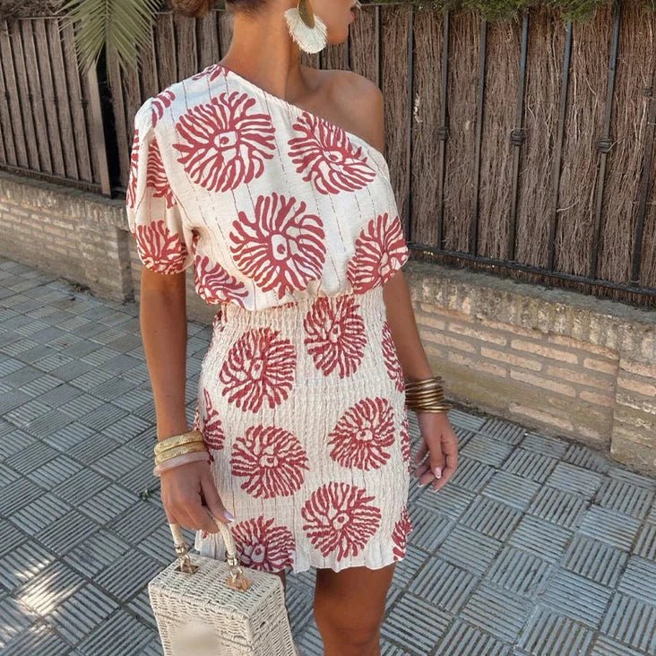 Paloma one-shoulder smocked mini dress in cream with red abstract print
