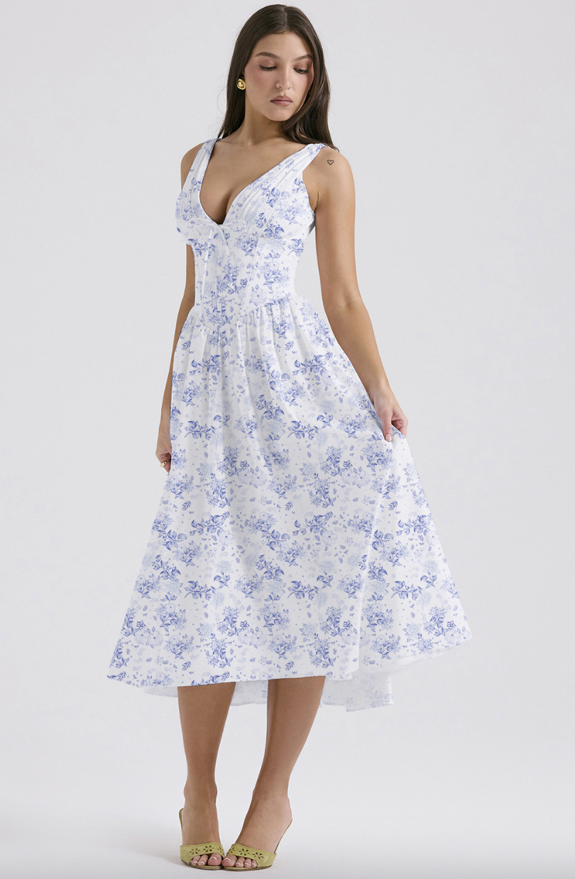 Woman wearing a sleeveless corset midi dress with a V-neck, tie bow and full gathered skirt - view 3