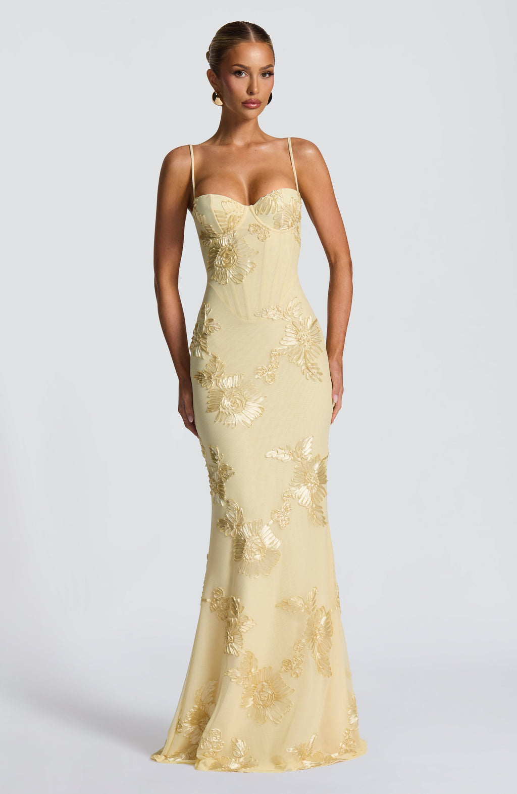 Pale yellow floral dress with corset bodice, sweetheart neckline and lace-up open back