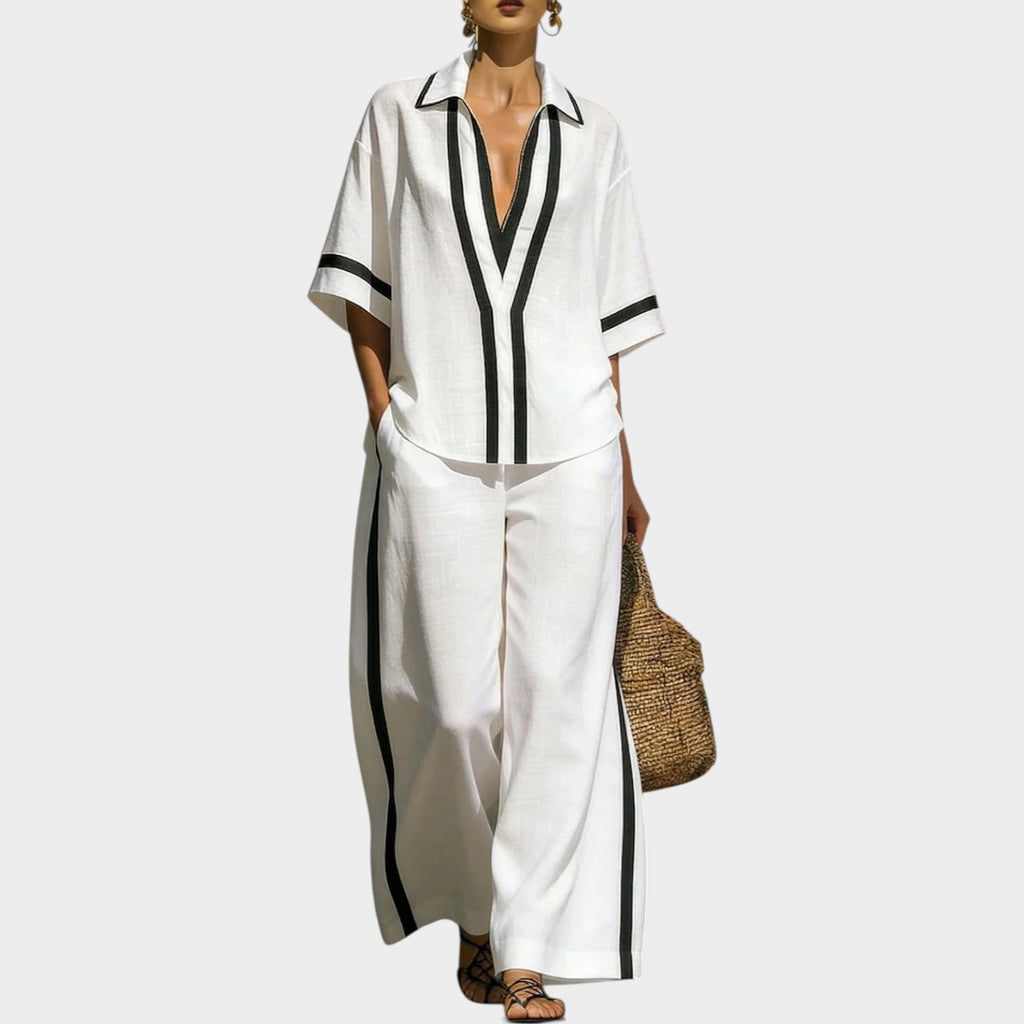 Women's wide leg linen set with black contrast trim, collared V-neck top and matching pants